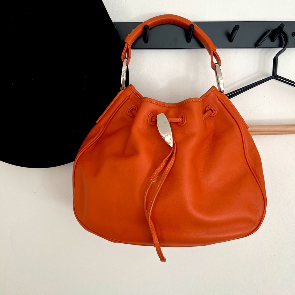 TODS Hobo bag orange leather with polished silver hardware excellent condition
